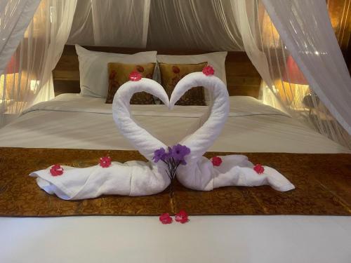 Кровать или кровати в номере Gladak di Uma Bali