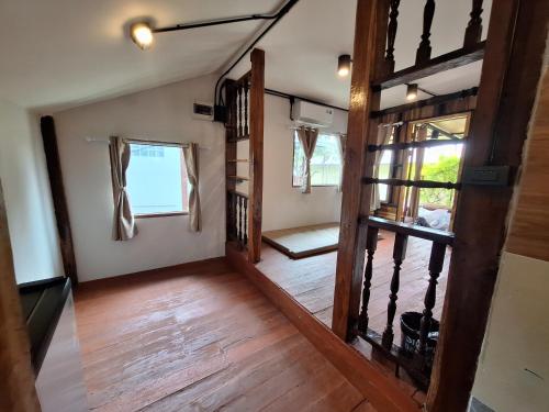 a view of the living room of a tiny house at The Seasons At Pai in Pai