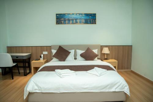 Puli Passo Hotel Casinoにあるベッド