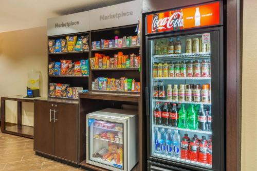 a drink cooler in a store with drinks in it at Comfort Suites Lady Lake - The Villages in The Villages