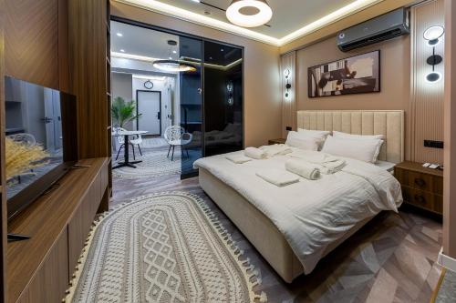 Ένα ή περισσότερα κρεβάτια σε δωμάτιο στο U-Tower City View Apart