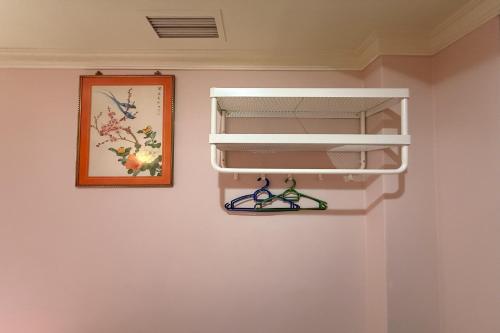 Palanda nebo palandy na pokoji v ubytování Hotel Fuji