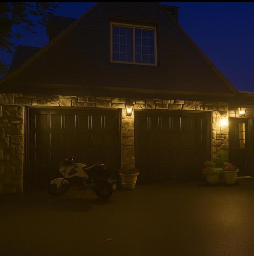 a house with two garage doors at night at The Highland Oasis in Ephrata