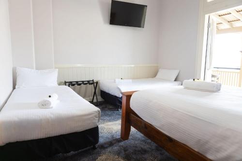 Royal Hotel Merriwaにあるベッド