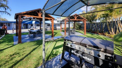 Κήπος έξω από το Almare Tourist Motel