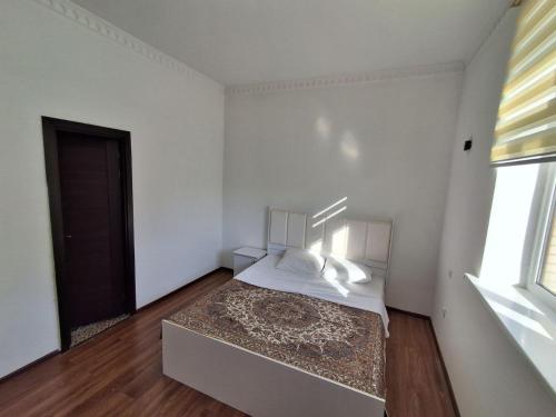 Katil atau katil-katil dalam bilik di Xojai Jahon HOTEL in Gijduvon