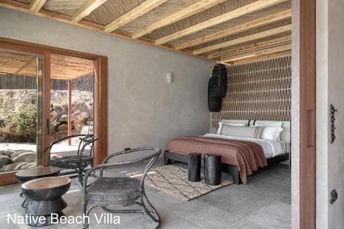 Ένα ή περισσότερα κρεβάτια σε δωμάτιο στο Elafonisi Villas