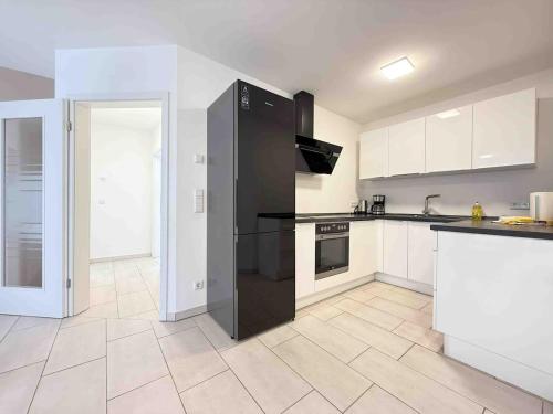 Η κουζίνα ή μικρή κουζίνα στο MAX114 moderne Monteurwohnung