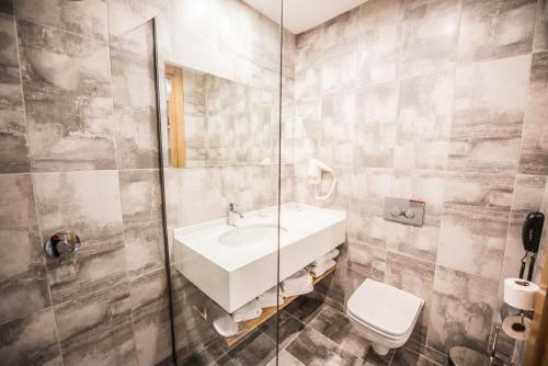 Ванная комната в Ingate Hotel