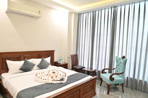 Postel nebo postele na pokoji v ubytování Hotel Devaan