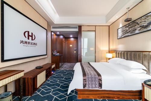 Postel nebo postele na pokoji v ubytování Guangzhou Hongzhou Century Hotel-Free shuttle bus during the Canton Fair