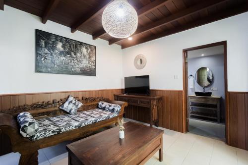 TV a/nebo společenská místnost v ubytování Sundhara View Ubud