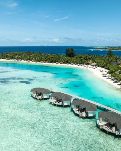 an aerial view of an island in the ocean at Cinnamon Dhonveli Maldives in North Male Atoll