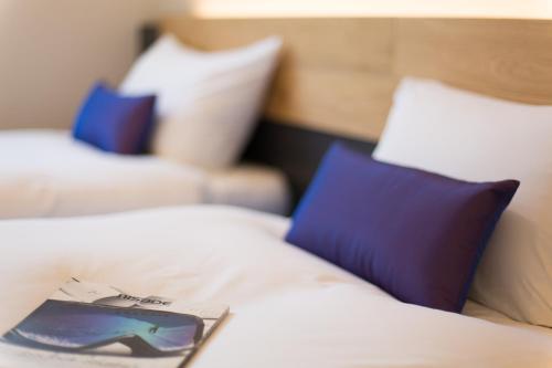 Una cama o camas en una habitación de Always Niseko