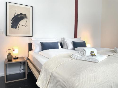 Ένα ή περισσότερα κρεβάτια σε δωμάτιο στο Blueberry Living - Design-Apartments am Starnberger See, Natur & Erholung, Privatparkplatz, nur 400 m zum See