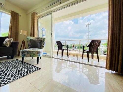 Ruang duduk di Olive Service Apartments New Town