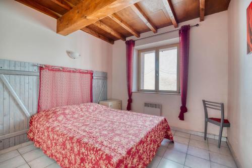 Gîte Le Lilas - Gîte À La Fermeにあるベッド