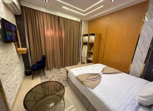 Кровать или кровати в номере Lumina Pyramids Inn