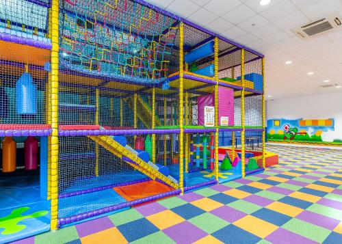 a room with a play area with colorful play equipment at North Devon Resort Budget in Ilfracombe