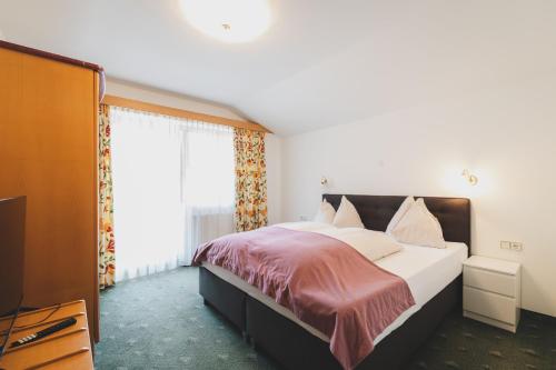 Postel nebo postele na pokoji v ubytování Das Jennerwein Appartement