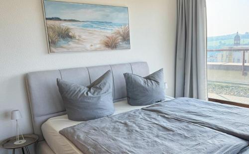 Zentrale Penthouse Suiten mit Goldstadtblickにあるベッド