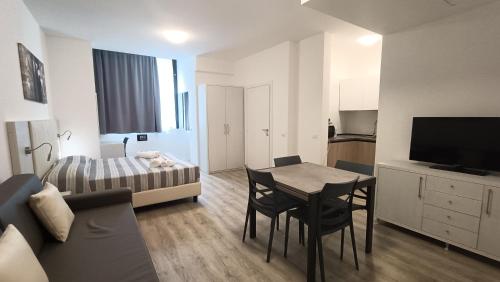 Ένα ή περισσότερα κρεβάτια σε δωμάτιο στο Residence Hotel Angeli