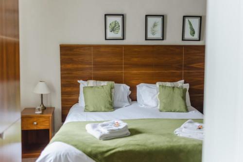 Ένα ή περισσότερα κρεβάτια σε δωμάτιο στο The Greyhound Hotel Cromford
