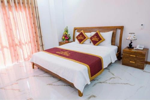Katil atau katil-katil dalam bilik di Quang Tung Heritage Cat Ba Hotel