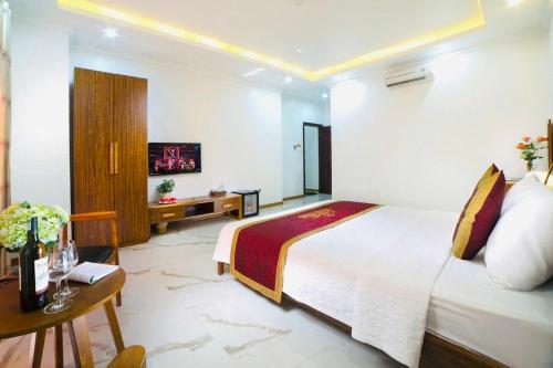 Televisyen dan/atau pusat hiburan di Quang Tung Heritage Cat Ba Hotel