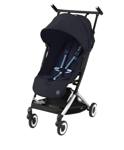 a black baby stroller on a white background at Etoile Kagurazaka-Queen Room near Shinjuku, Self Check-in in Tokyo