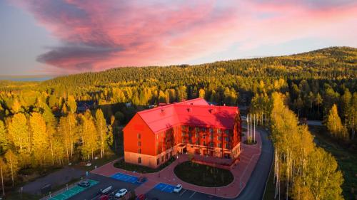 an aerial view of a building with a red roof at Break Sokos Hotel Koli Kylä in Kolinkylä