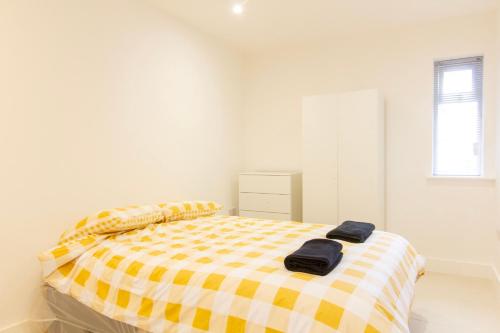 Ένα ή περισσότερα κρεβάτια σε δωμάτιο στο Radstock Road - Room 1a