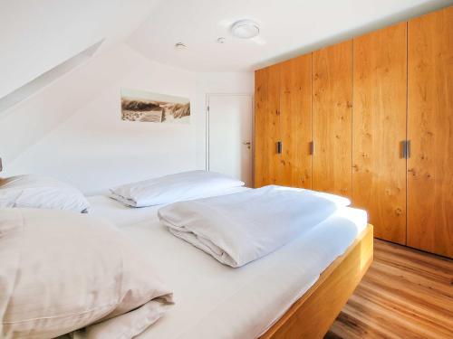 Ένα ή περισσότερα κρεβάτια σε δωμάτιο στο Leybucht