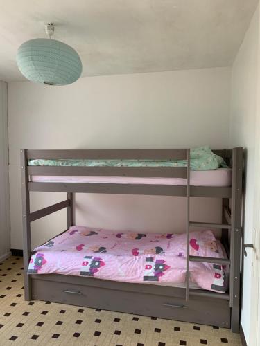 Voodi või voodid majutusasutuse villa Les Pieds Dans l'Eau sur les plages du débarquement toas