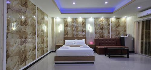 Кровать или кровати в номере VENTURA Boutique Residence