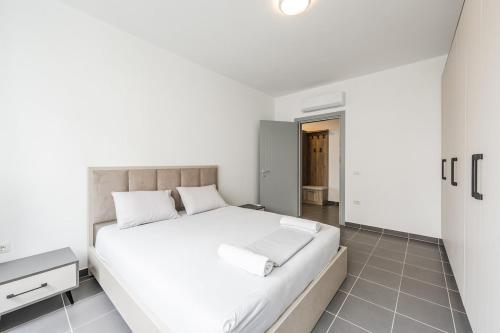 Katil atau katil-katil dalam bilik di Talea Comfort Apartment 1
