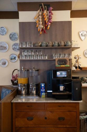 a kitchen with a counter with a coffee maker at Haus Kärnten in Döbriach