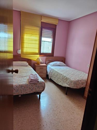 Ένα ή περισσότερα κρεβάτια σε δωμάτιο στο Rafas home 19