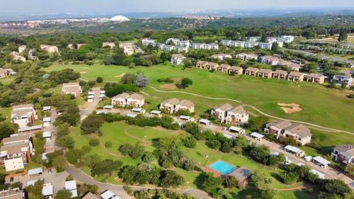an aerial view of a suburb with houses at Wentworth star in Roodepoort