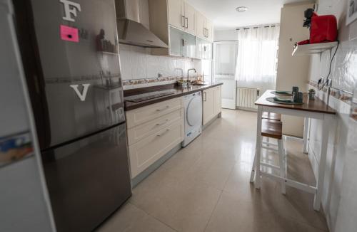 Η κουζίνα ή μικρή κουζίνα στο House Atarfe