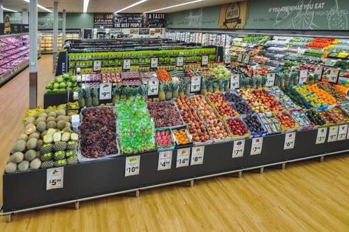 a produce section of a grocery store with fruits and vegetables at Baldivis Home Close to IGA, CAFE, Restaurants, 15 mins to beach in Baldivis