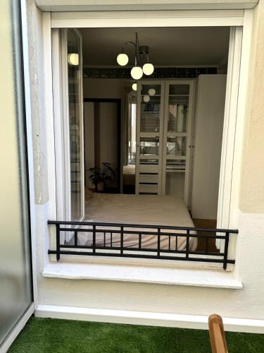 a view of a balcony from a house at Carré d'Or - 2P Cosy avec Terrasse et véranda in Nice