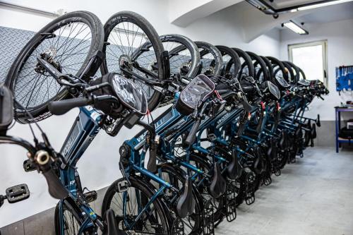 a row of bikes lined up against a wall at Palazzo ReSilente- B&B dell'Infopoint in Castelnuovo Cilento