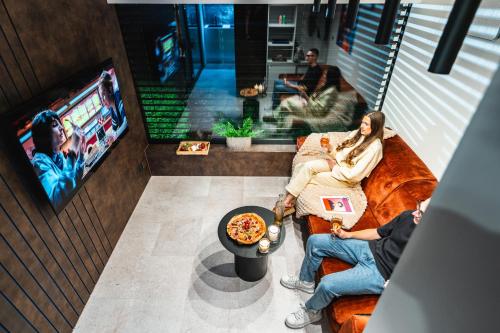 Televisyen dan/atau pusat hiburan di Ostravinka - Boutique Apartment