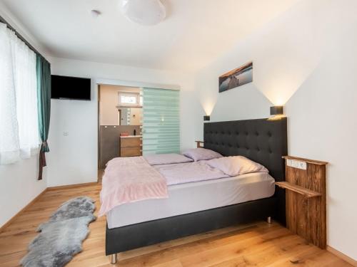 Chalet in Stuhlfelden near Ski Slopesにあるベッド