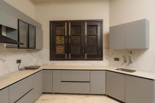 Una cocina o zona de cocina en City Vibes B&B