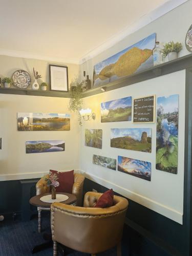 a living room with a couch and a table at Royal Goat Hotel in Beddgelert