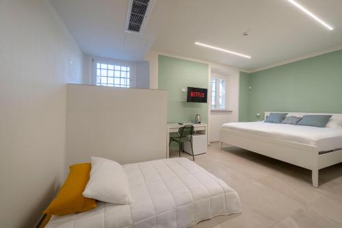 Katil atau katil-katil dalam bilik di Le finestre sul Lago - Lake Como Front - Free Parking and AC