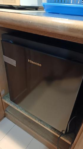 a drawer in a desk with the hilbert logo on it at CosY Klebang Homestay in Kampong Lereh