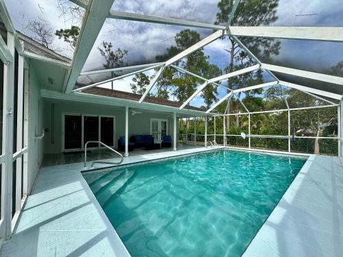 Kolam renang di atau dekat dengan Charming house in peaceful Naples surrounded by nature and close to the beach